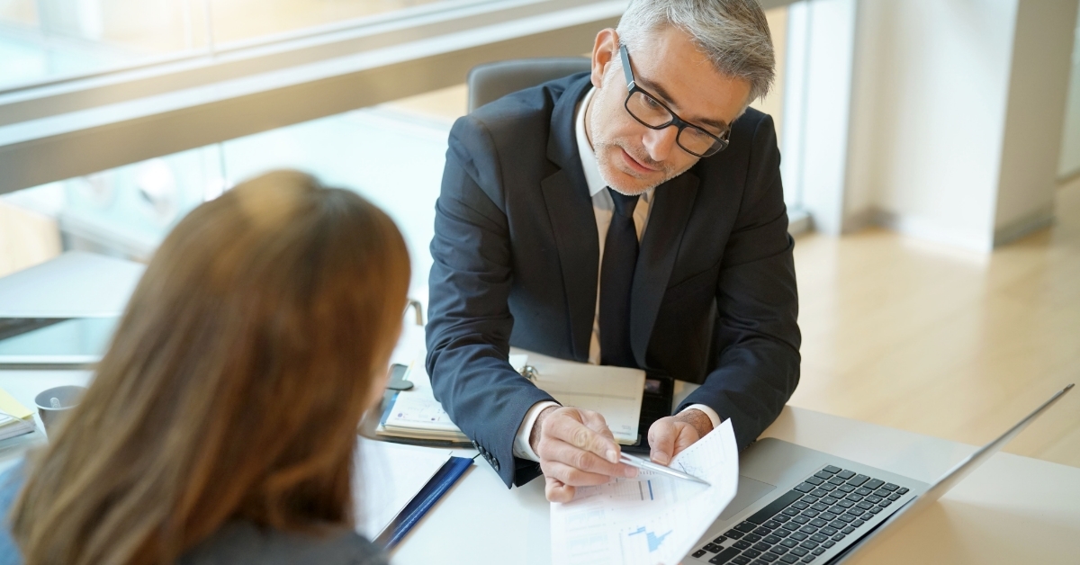 woman consulting senior finance advisor