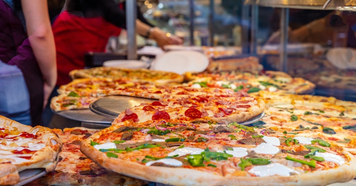 Assorted italian pizzas at shop display