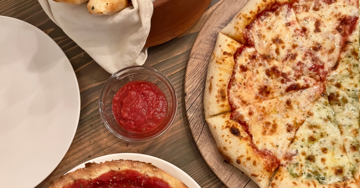 Homemade pizza breaksticks on table