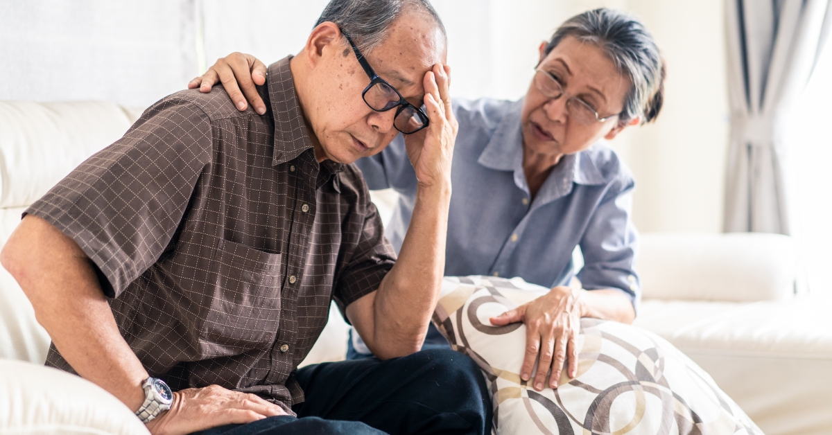 old man having headache 