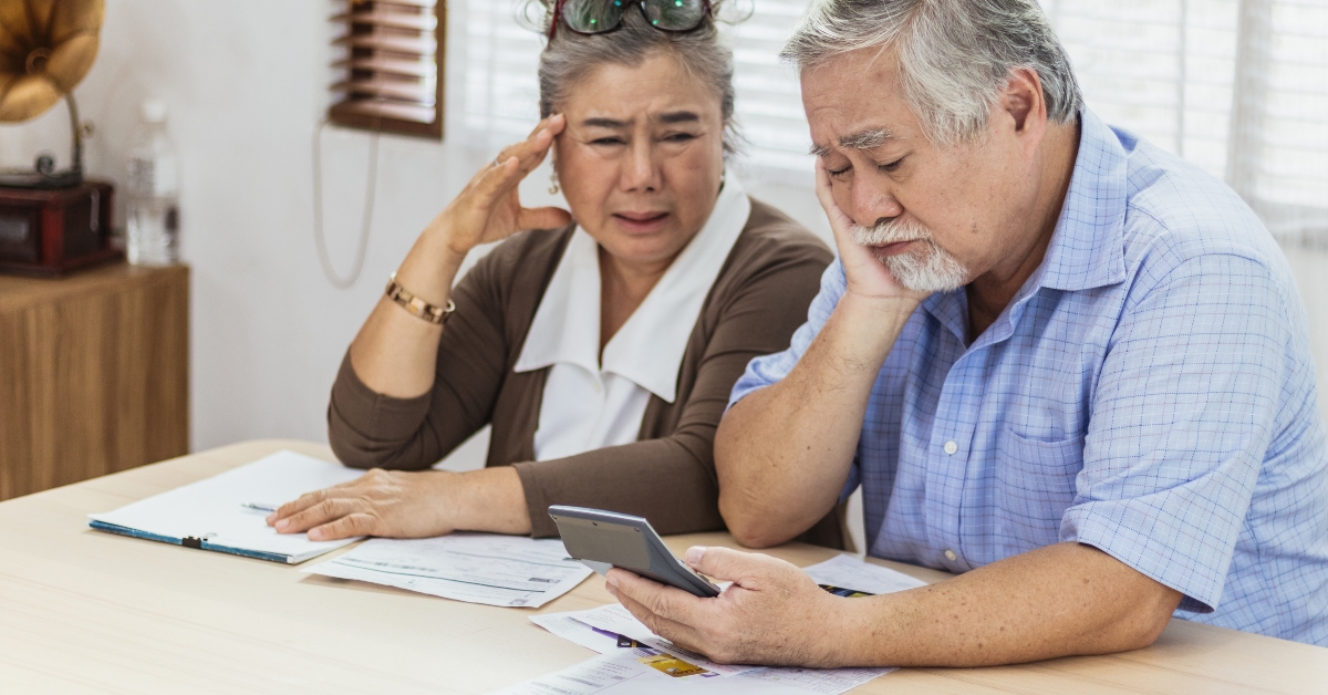stressed senior elderly couple 
