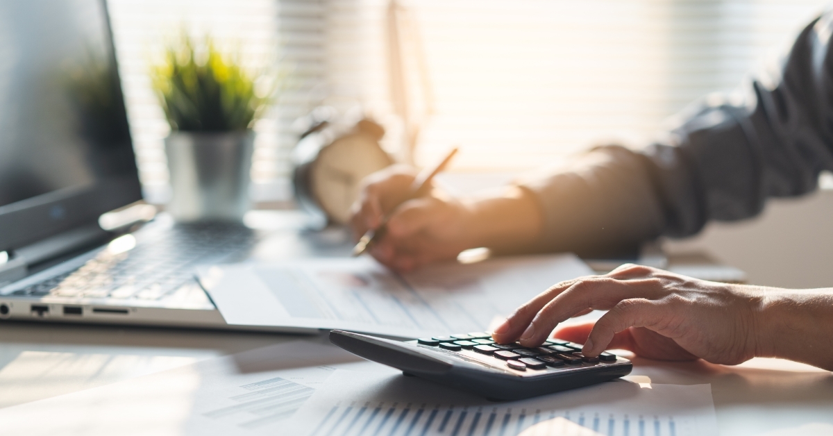 Businessman calculating business balance Tax deduction concept