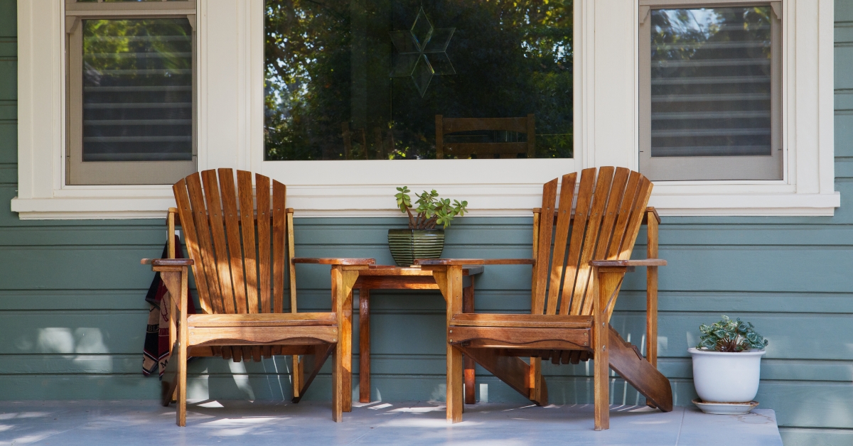 Two adirondack chairs porch