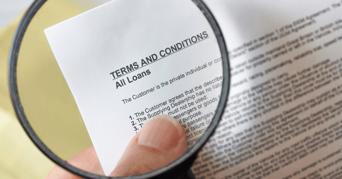 Terms and conditions aper with magnifying glass
