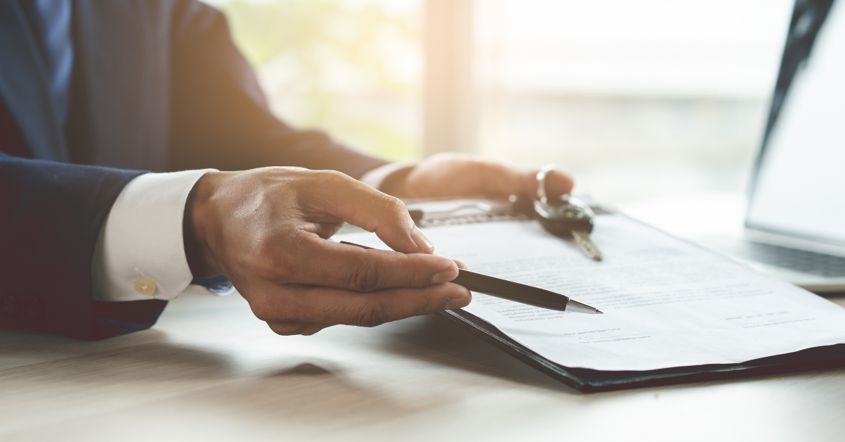 Client signing car lease form