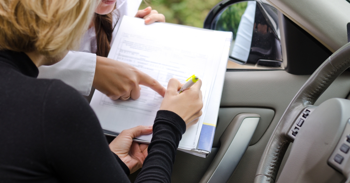 Woman signing a deal
