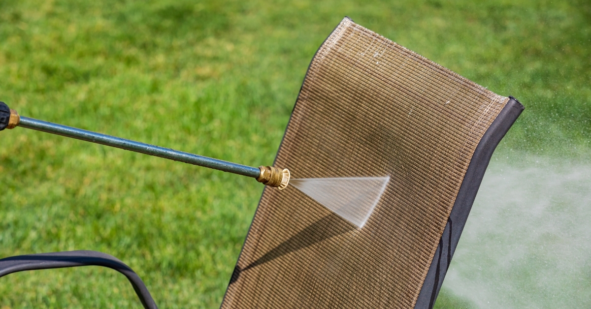 Cleaning patio furniture with pressure washer