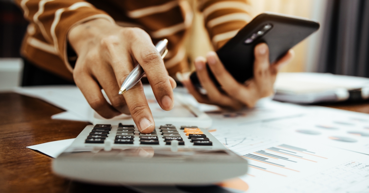 Female accountant making calculation