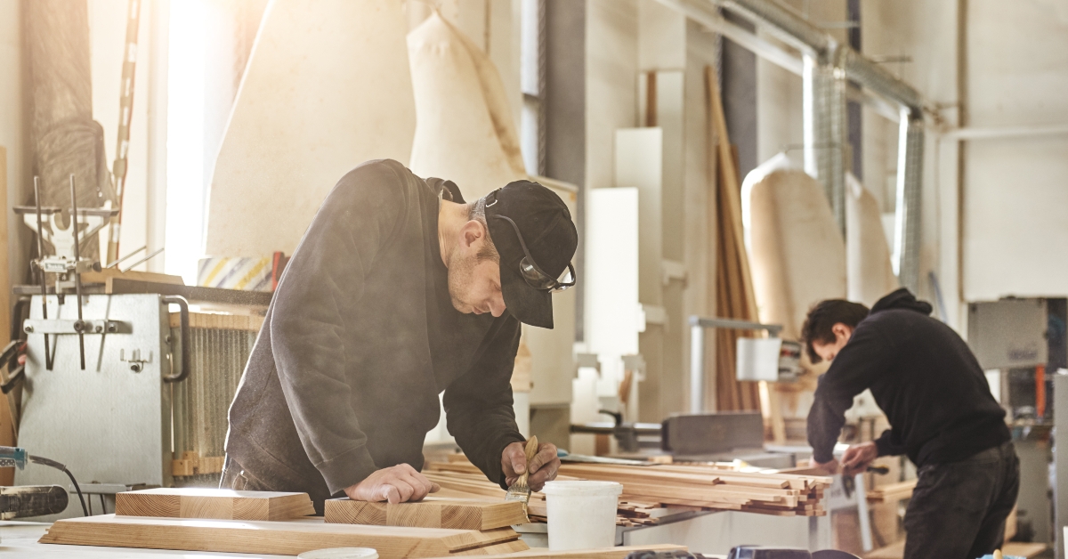 Worker holding a brush