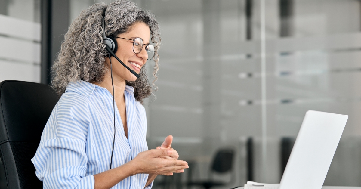 female support service employee talking to customer