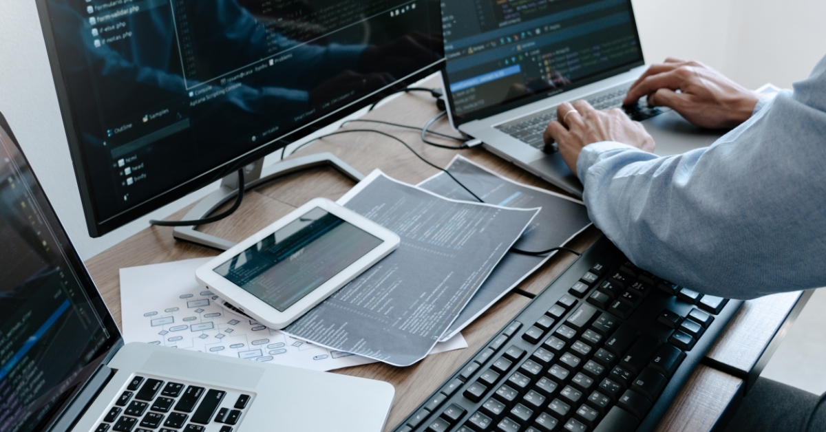programmer coding using laptop coding concept