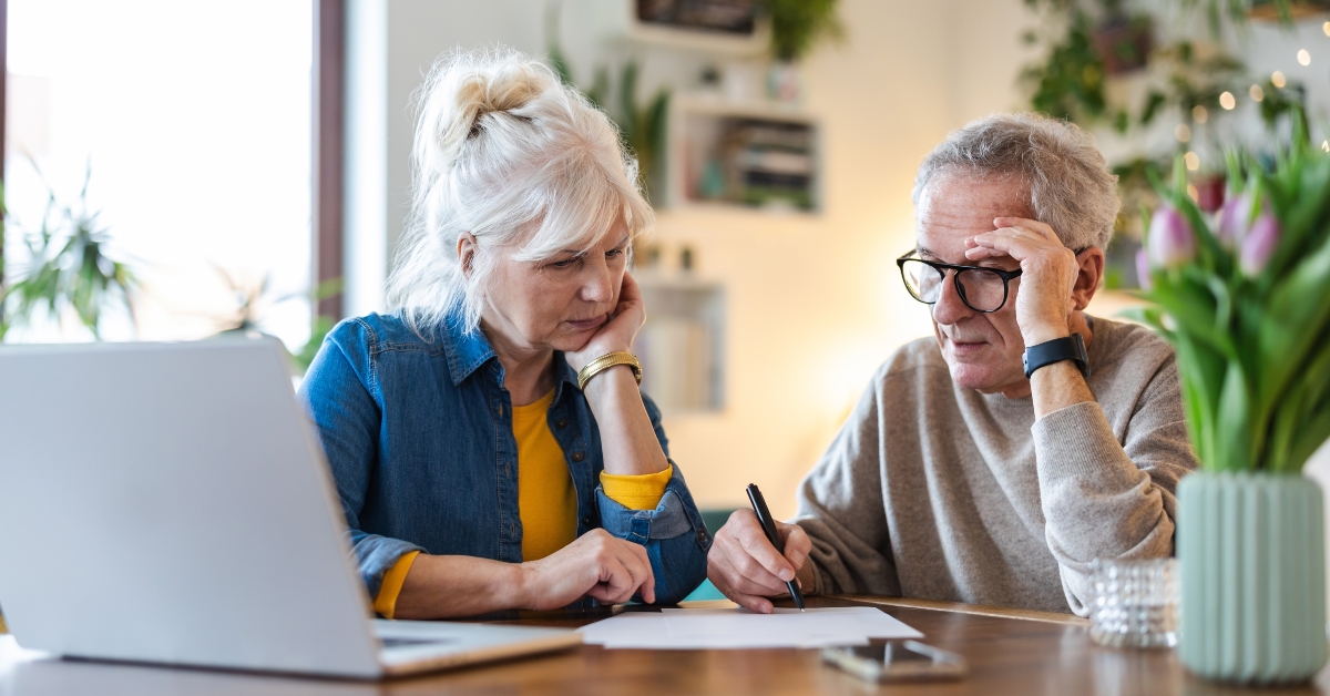 senior couple sitting at the table