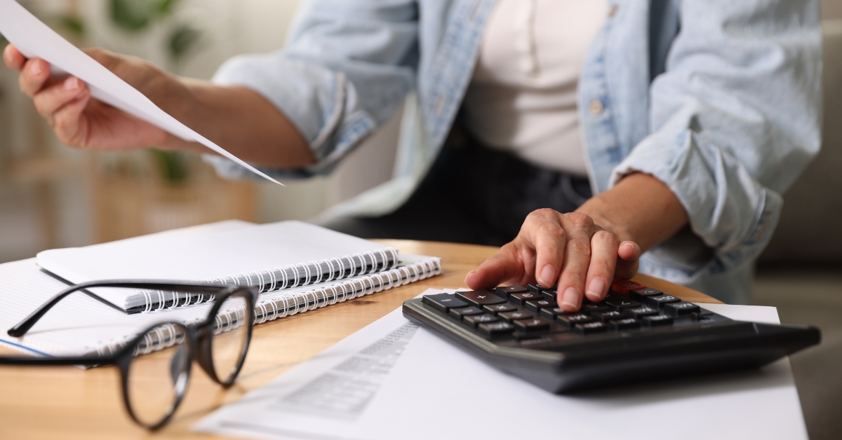 woman using calculator