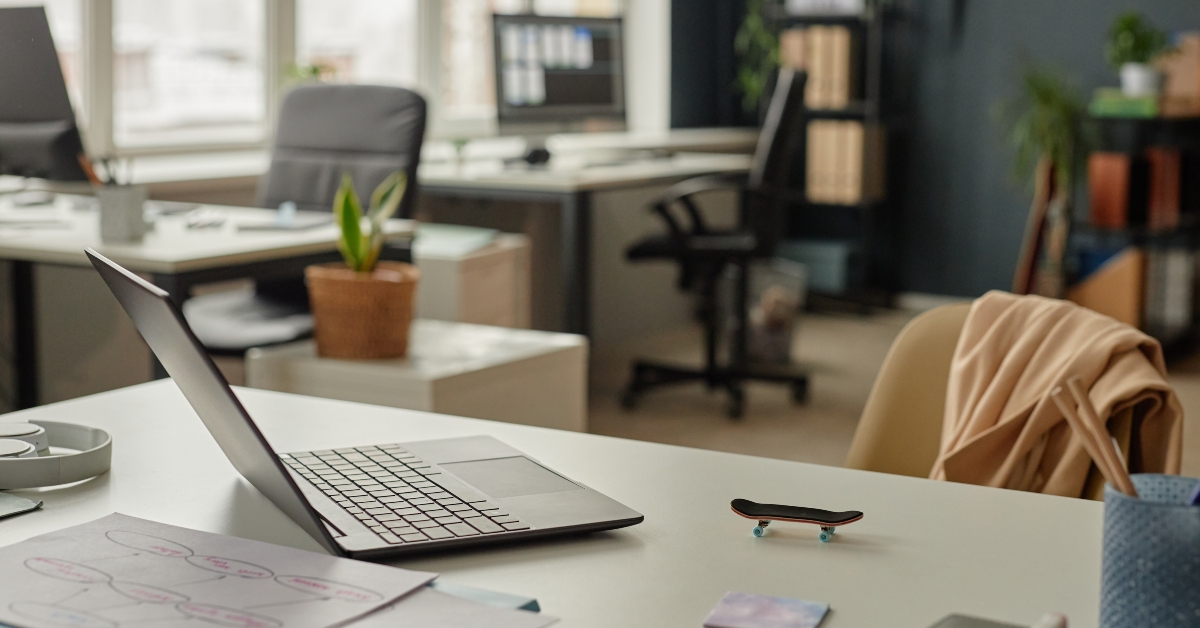 workplace desk with clutter