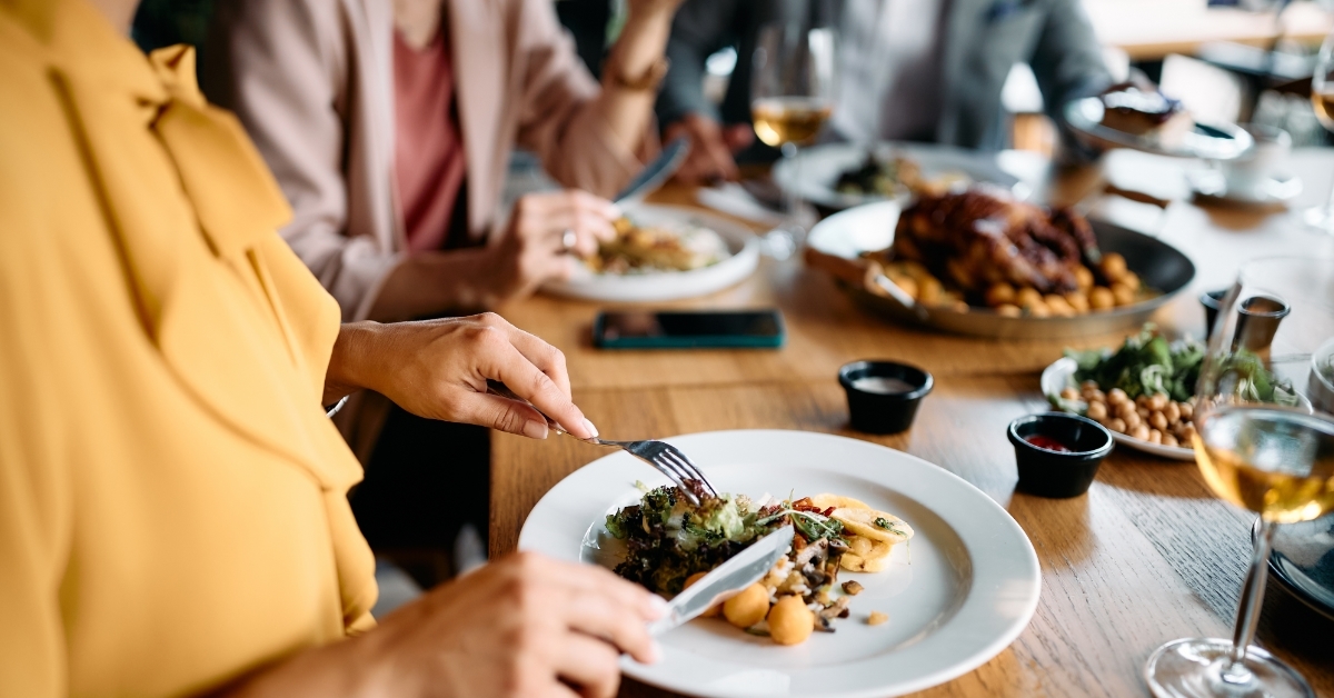 entrepreneurs having business lunch at restaurant