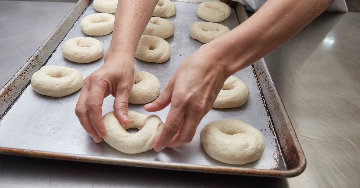 baker making bagel