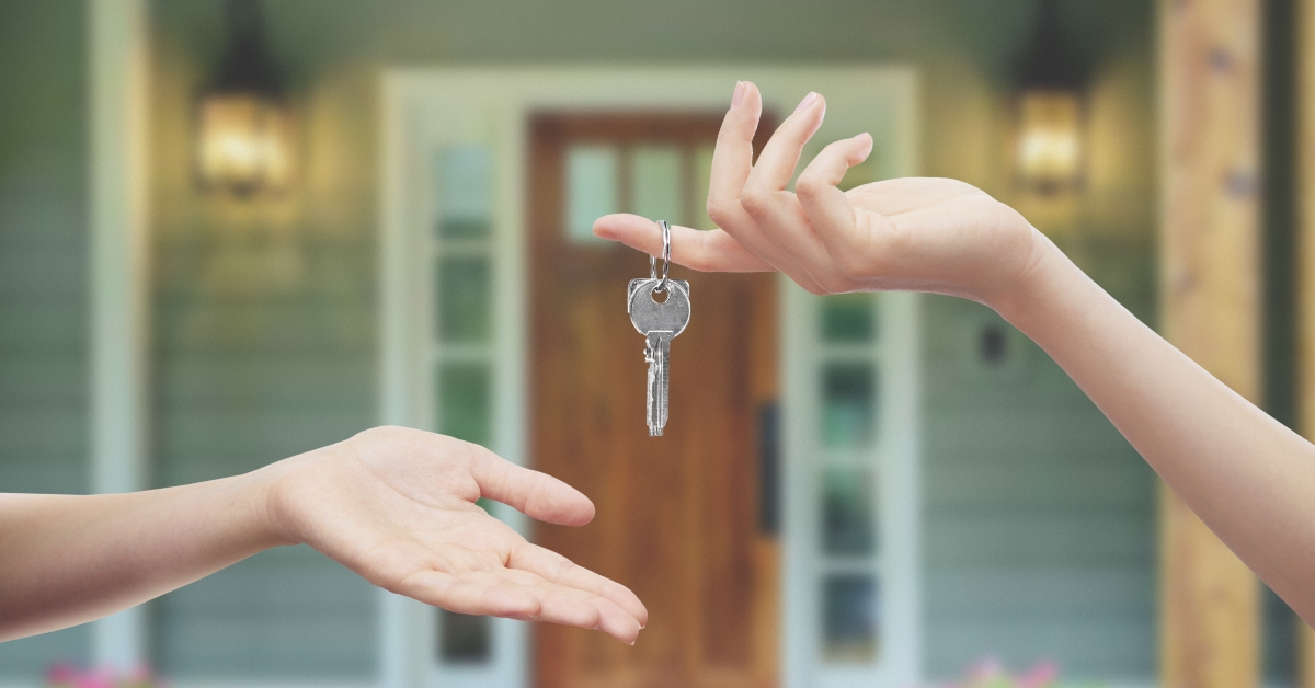 Hands with keys home background