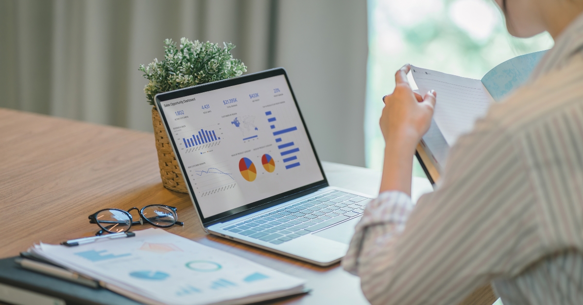Accountant using graphs and charts