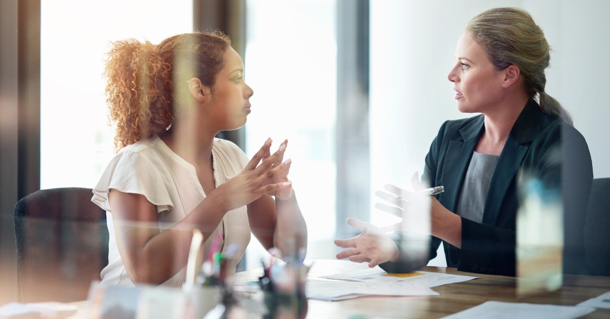 woman consulting finance advisor at office