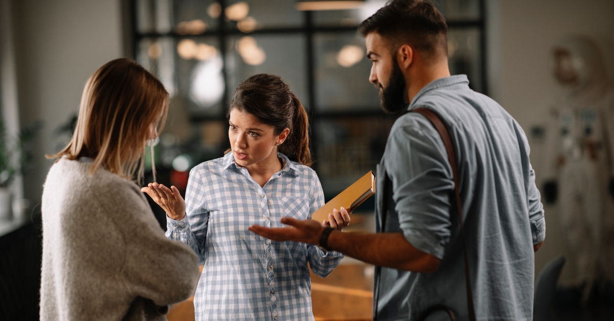 colleagues arguing in office