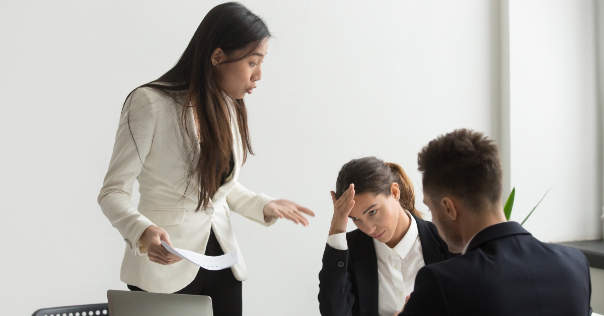 executive shouting at subordinates