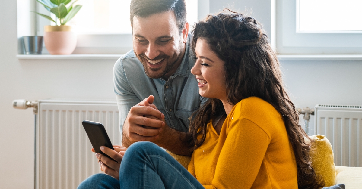 couple looking mobile phone