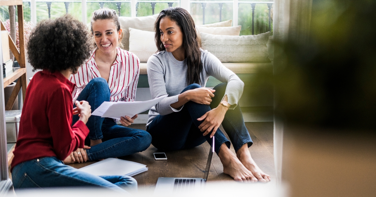women with laptop and documents