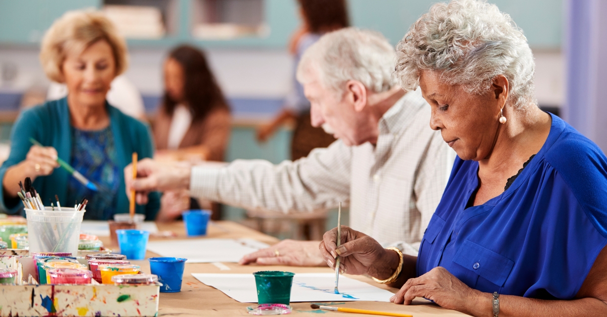 retired seniors attending art class