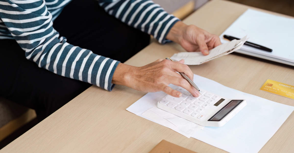 Senior Calculating financial at Home