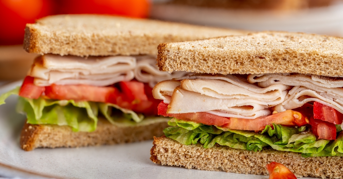 delicious Turkey Sandwich With Tomato and Lettuce