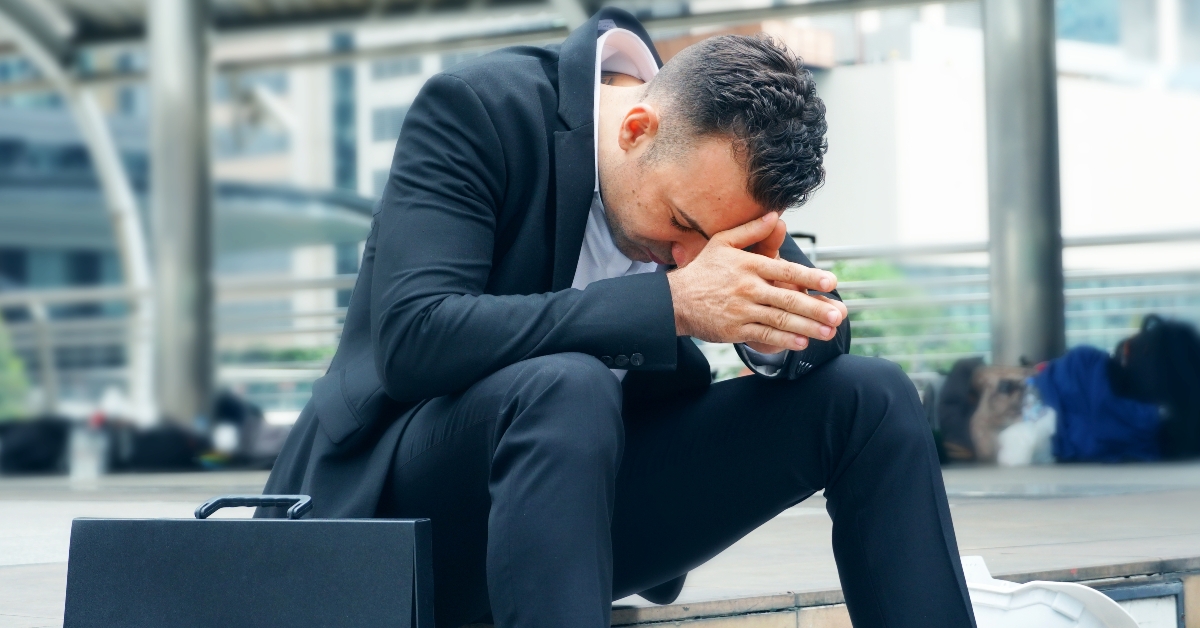 Businessman sit on the stairs