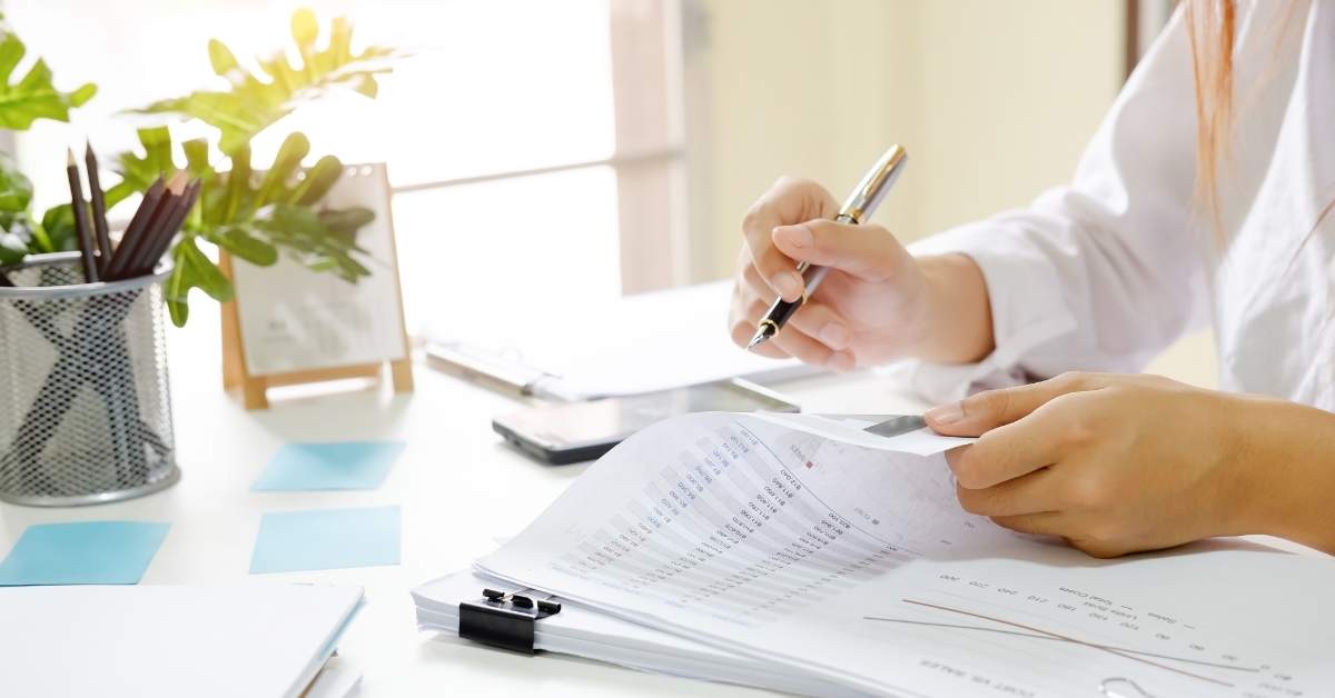 female accountant doing audit at workplace