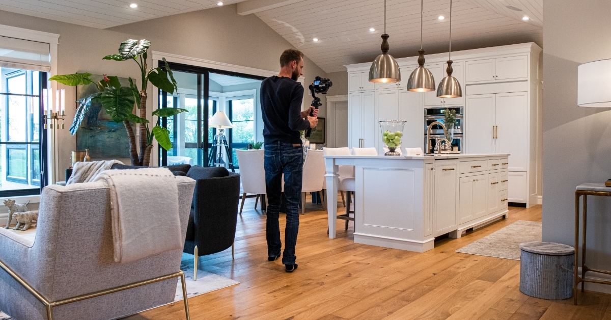 Photographer filming house for real estate video