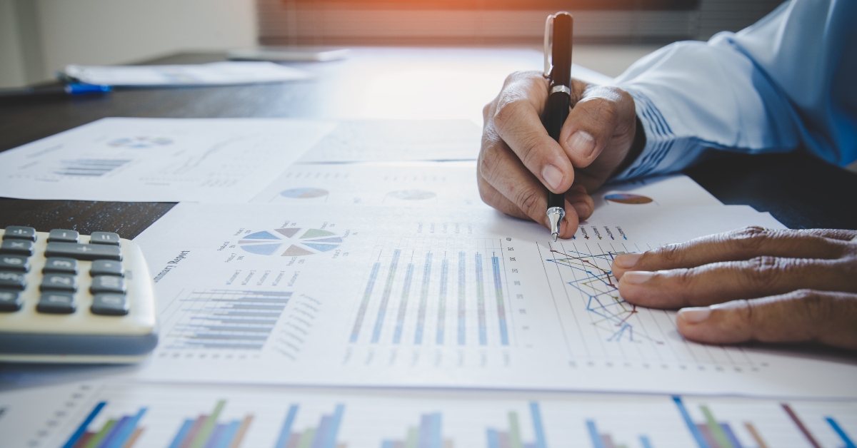 Business woman looking at charts