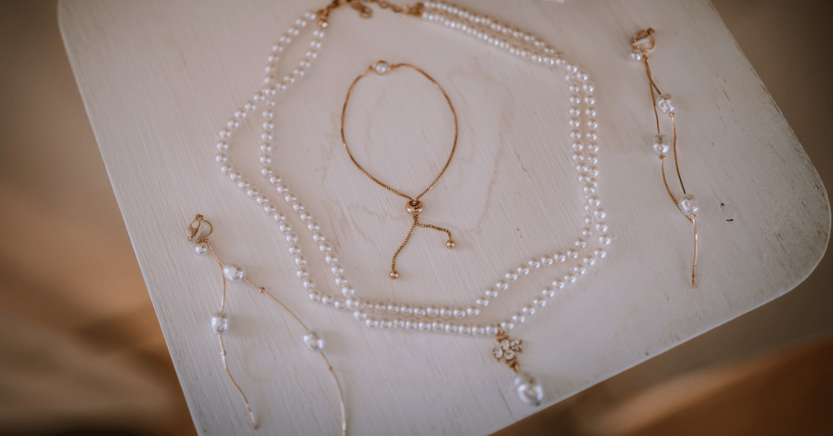 Elegant pearl jewelry set including necklaces, bracelets, and earrings