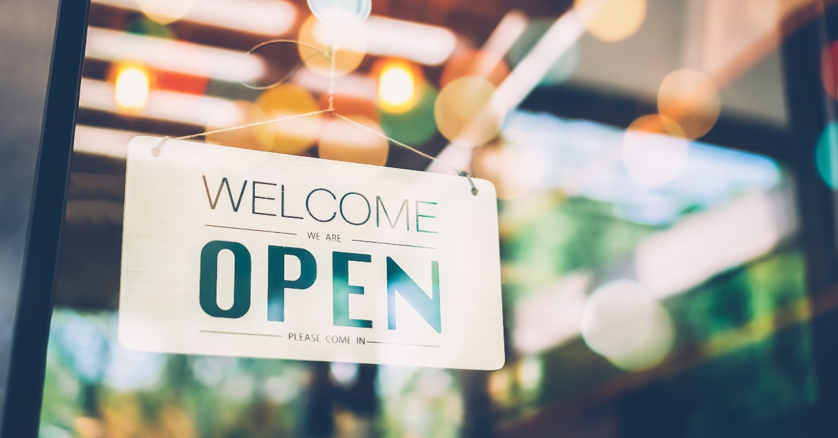 Business sign that says ‘Open’