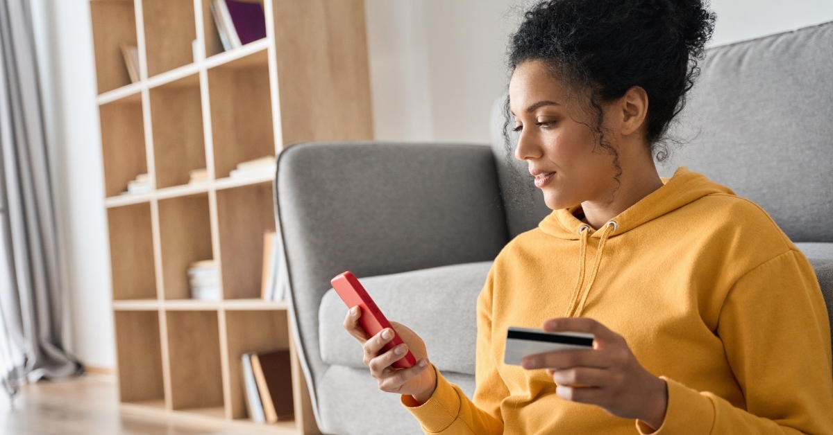 woman shopping online using card