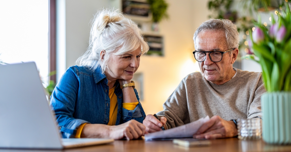 senior couple discussing home finances