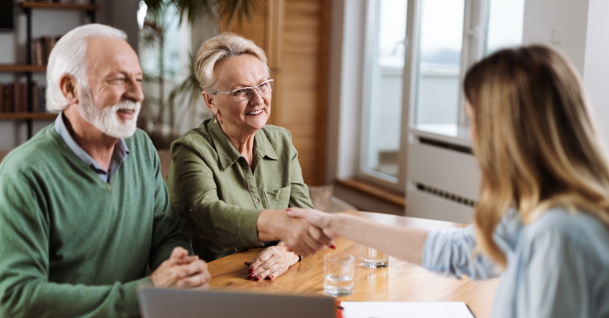 shaking hands with a financial advisor