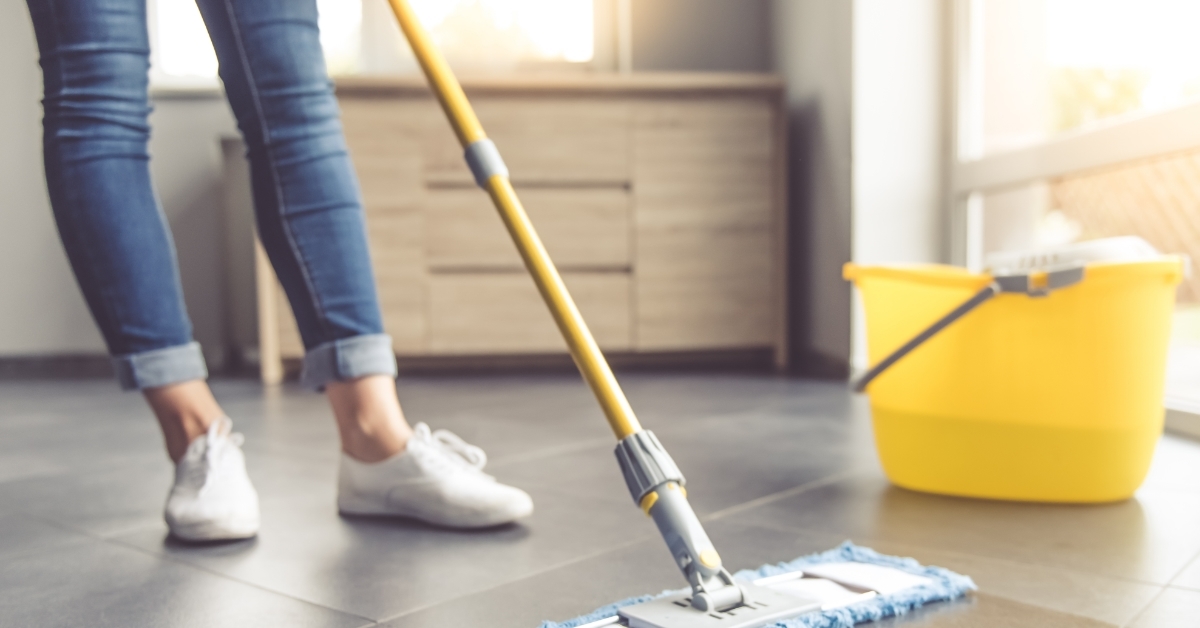 Woman cleaning her house