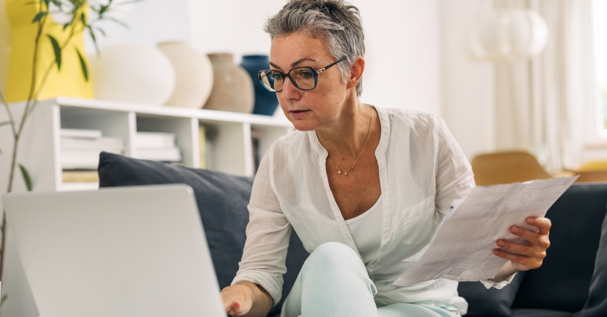 elderly woman doing taxes 
