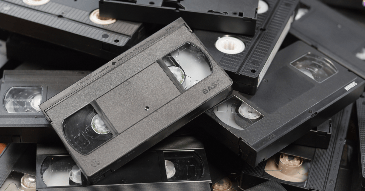 Messy stack of VHS tapes