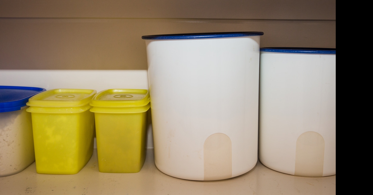 tupperware canisters in a pantry 