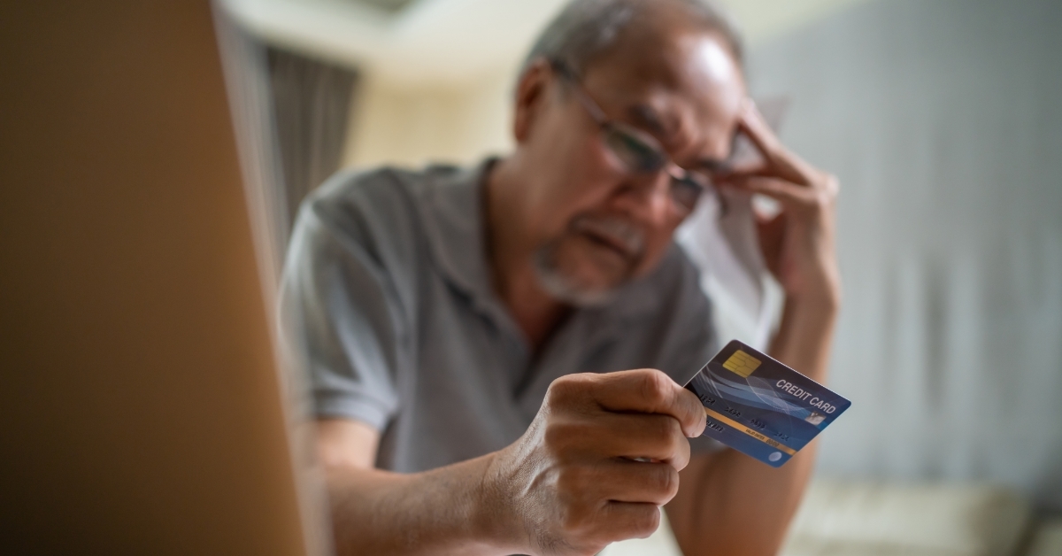 Depressed Senior man worried about financial problem