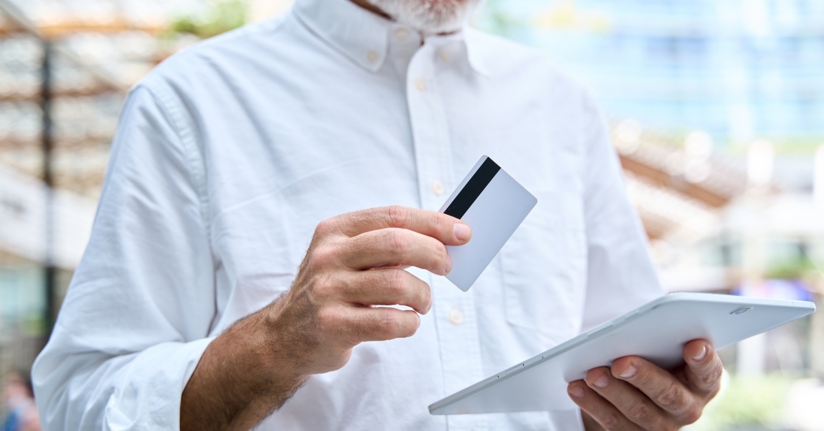 holding digital tablet 
