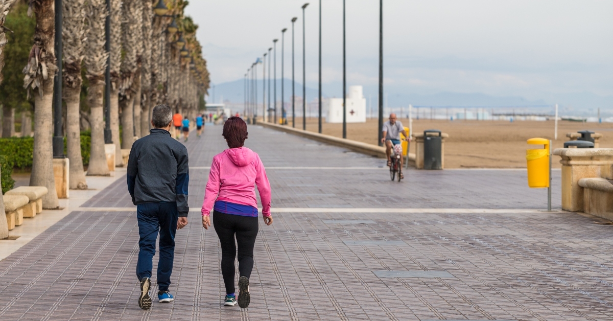 couple walking on a cement