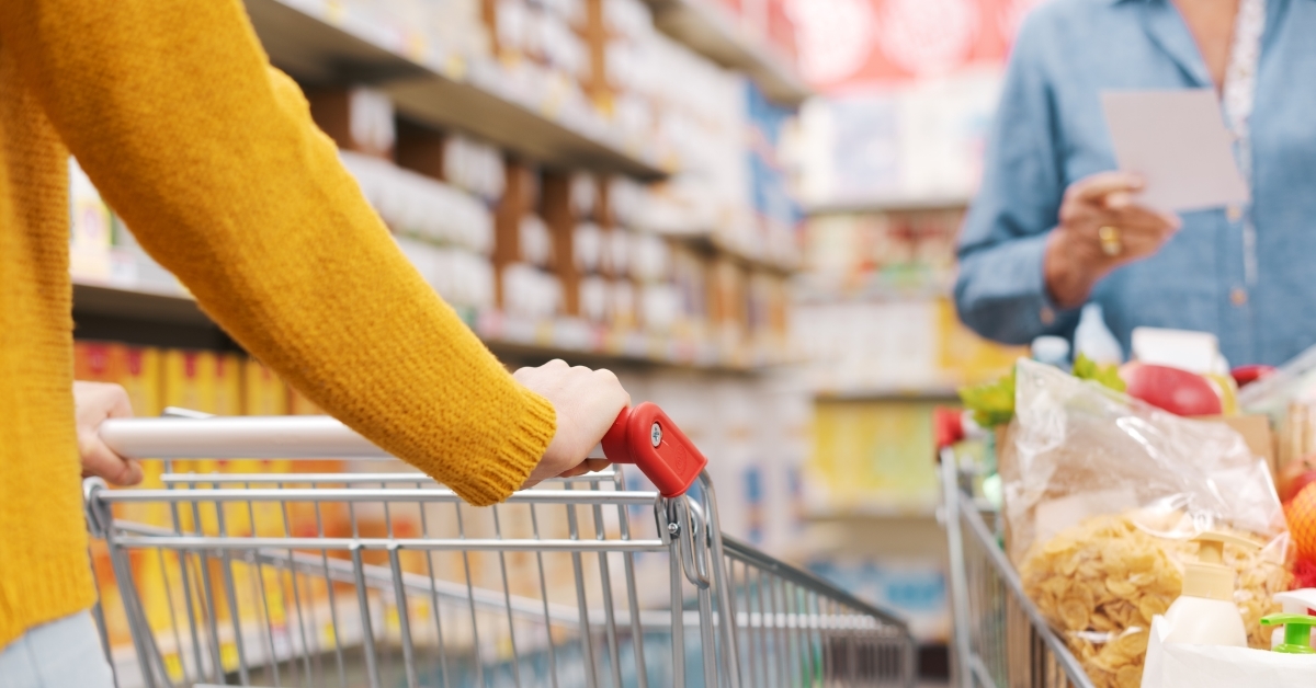 Customers doing grocery shopping at store