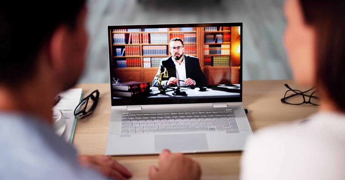 couple attending online meeting with attorney