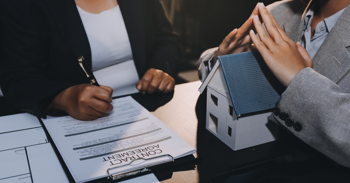 hand signing mortgage contract