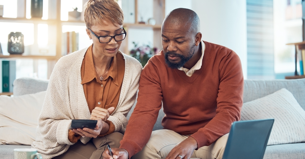 happy african american couple planning budget